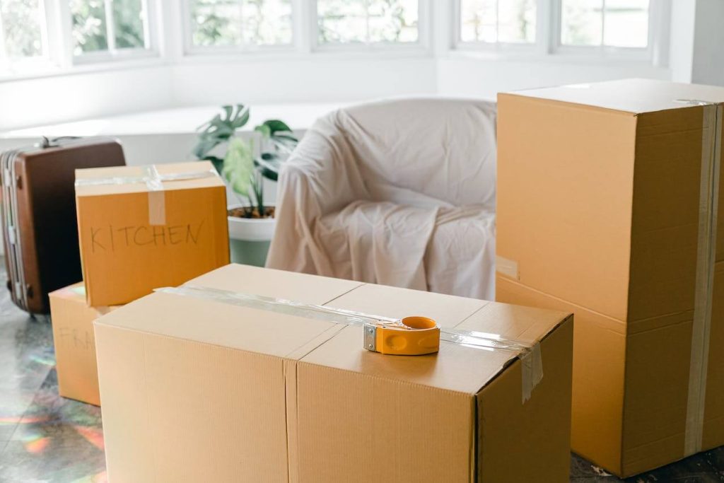 moving boxes stacked in living room