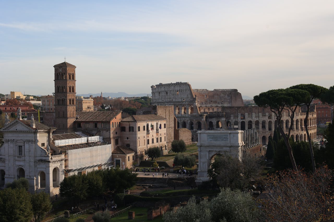 A panoramic view of the colosseum in Rome and its surrounding structures